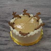 Reindeer Gingerbread Reindeer gingerbread on a Eggnog mousse cake.