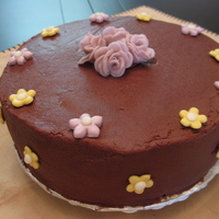 Mother's Day Flower Cake Cake is made of chocolate butter creme icing and fondant flowers. Made for my mom on mothers day