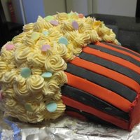 Cupcake Birthday Cake Cupcake Birthday Cake, lemon cake with butter cream icing, and fondant for the "wrapper"