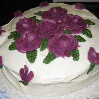 Purple Roses And Flowers Part of my Wilton I class. I tried to be creative making carrot cake and cream cheese icing. the icing was a little too soft and the cake...
