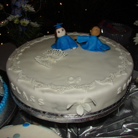 Graduation Cake marble cake, lace decoration, pastillage buterfly, and flower