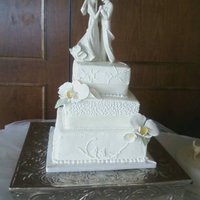 Monica's Cake all the cake is vanilla with butercream frosting, royal icing piping, pastillage the orquids.