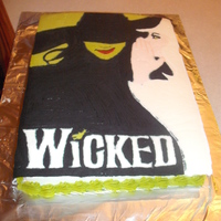 Wicked The Musical Cake Decorated by making a fbct. I made this for my mom's birthday. She's a huge fan of the show just like I am!