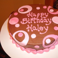 Pinkand Brown Polka Dots Chocolate cake, frosted with chocolate buttercream. MMF dots.