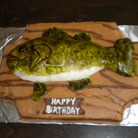 Fish vanilla cake with buttercream icing. fish made out of rice krispy treats and covered in mmf