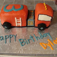 Fire Truck Birthday Buttercream icing, smarties for lights. I ran out of time on this cake, I had so many ideas not implemented. Lots of work and not exactly...