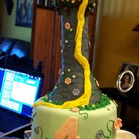 Rapunzel Cake A tangled themed cake for a little girl turning 4. A lot of hours went into this cake. I really didn't get any good photos but it came...