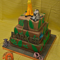 Jungle Themed 1St Birthday I know I need to iron my backdrop, but it was hell just trying to get this cake out the door on time... which I wasn't quite able to...