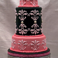 "anna" I loved making this cake!!! Lots of firsts for me... First stenciling, tallest single fondant covered tier (the 6" double barrel),...