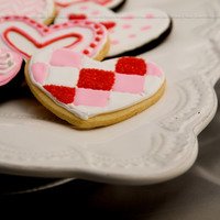 Valentine's Chocolate & Vanilla Sugar Cookies with Royal Icing. Checkered Heart: Flooded Red first, sprinkled with red sugar, and let dry while...
