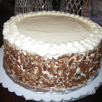 Italian Cream Cake Italian Cream Cake, Cream Cheese Icing with pecan crusted sides and rosette border