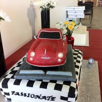 Prosche Fondant Sheet Cake I made this for a car dealership's grand opening, I put together working LED lights for the highlights and back tailights, battery...