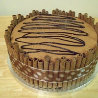 Chocolate Sin Cake Chocolate cake, Chocolate buttercream with Pirouette wafers and Chocolate drizzles.