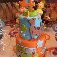 Scooby Doo Cake Dummy 4"/6" dummy tiers made as a centerpiece for a Scooby Doo birthday party. I made coordinating cupcakes for everyone to eat.
