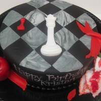Twilight Series Cake 8" double layer red velvet (of course!) cake covered in Duff's black fondant. All fondant accents including the apple &...