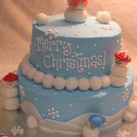 Snowman Cake 2 tier (6" & 8") dark chocolate cake with peppermint buttercream. All snowpeople were made out of fondant. Snowballs are...