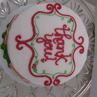 Christmas "thank You" Cake 6" cake I made for the photographer who took our family Christmas pictures. White peppermint cake with candy cane buttercream.