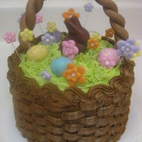 Easter Basket Cake Double layer 6" cake (one layer strawberry, one layer orange) with buttercream basketweave & grass. Fondant handle & wired...