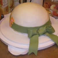 Wilton Course 3 - Fondant Cake This was supposed to be the "present" cake from the Wilton Course 3. I decided to do mine out of a dome pan, and so it turned...