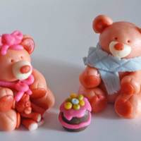 Teddies This is my very first attempt at 3d modeling. I should use it as a topper for a baby birthday cake. I used marzipan