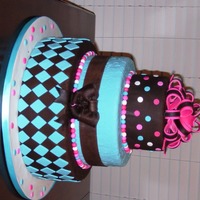 Bright And Wild Wedding Cake! This was my first "real" cake. My son and his bride had a whimsical wedding theme and wanted bright colors on their cake. The...