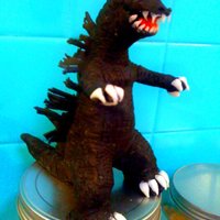 Godzilla Modeling Chocolate Figure I made this for my neighbor's son who was turning 13. Entirely handsculpted out of modeling chocolate.