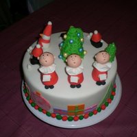 Christmas In The Snow fondant covered coconut cake with white chocolate ganache