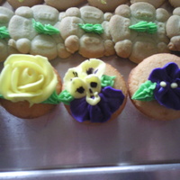 Springtime Phots Was asked to do very simple pansies, roses, and sweet peas for a Springtime Bridal Shower. These are mini-cupcakes, piping is done with...