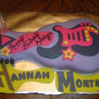 Hannah Montana Guitar Cake Box cake mix , buttercream and mmf. I used the Wiltons guitar pan.