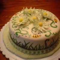 Cutsie Last Wilton class cake-Gumpaste & fondantDevils food w/ rasberry filling and buttercreamfondant covered, gumpaste flowers, grass, vines...