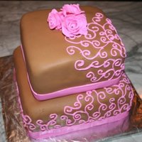 Pink And Brown Swirls I was going to cover the whole cake but decided to just do it crawling up one corner. Cake covered in fondant with fondant border and roses...