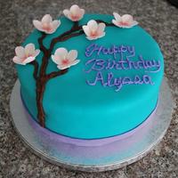 Asian Inspired Birthday Cake This was for a 13th birthday. The birthday girl asked for white cake with chocolate frosting AND fondant, the colors teal and lavendar, and...