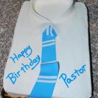 Shirt Cake This is my first shirt cake. Made it for our Pastor's birthday. It is just white buttercream with fondant collar and tie.