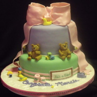 Teddy Bear Baby Shower Cake Bottom Tier is White Almond cake with Raspberry BC and Top Tier is Yellow Butter cake with Vanilla BC. This was my first time makling...