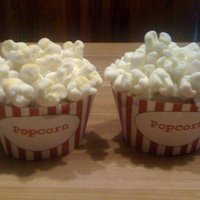 Popcorn Cupcakes Strawberry cupcakes with buttercream icing and mini-marshmallows. I've seen these in a number of pictures and really wanted to try...