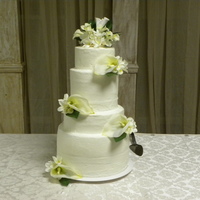 My First Wedding Cake! Top and bottom tier are red velvet with cream cheese filling. Middle tiers are white cake with white chocolate raspberry filling. I got it...