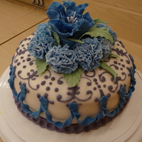 Wilton Iv Fondant Gumpaste Cake Wilton Fondant & Gumpaste, practice with fantasy flower and misc techniques. Decided to freehand some piping onto the cake with royal...