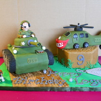 Army Cake Topper For Logan's 9Th Birthday This is the cake topper I made for our grandson, Logan's 9th Birthday. He loves "Army Stuff" , so I made a tank and...