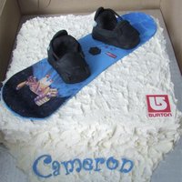Burton Snowboard Snowboard cake to look like the birthday boy's. Snow part is chocolate cake with oreo filling, snowboard is fondant and boots are rice...