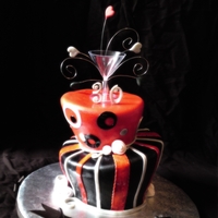 Fun Topsy Turvy For a 30th Birthday...My 1st time doing topsy turvy!! Theme was Red, Black and Silver...but it looks white in the picture due to my 1 yr....