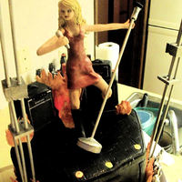 Taylor Swift Cake W/ Stage,fire, Chocolate Guitars,&amps I make this cake for a friend of my husband.. he was turning 24 and wanted a Taylor Swift cake more than anything... he was very specific...