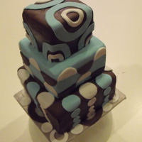 Mod Blue Brown And White Cake Modern square cake with differant types of dots and circle design in blue, brown and white. Made Feb 12 2010 for a friend's Birthday...