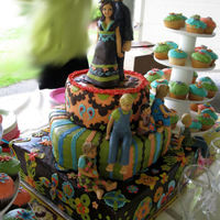 Bohemian Hippie Wedding W/ Gumpaste Family Of 7 My very first wedding cake for my very special freind . In addition to the cake, I made the Bride, Groom, and all 5 of thier children, out...