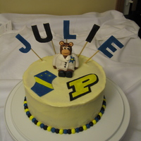 Lab Monkey A red velvet cake with white chocolate, cream cheese icing. All decorations are fondant (ball border, letters, Purdue P, AXE symbol, and...