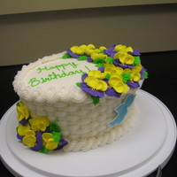 What A Pansy This was my final cake for Wilton Course 2 and I gave it to a friend for their birthday. It is a chocolate cake with buttercream frosting...