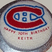 Montreal Canadiens Cake This cake is vanilla covered in buttercream icing stars. I used red and blue buttercream icing for the Montreal Canadiens logo and store...