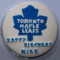 Toronto Maple Leafs Cake This is a 2 layer lemon cake. Buttercream icing between the layers, marshmallow fondant icing over the whole cake and buttercream icing for...