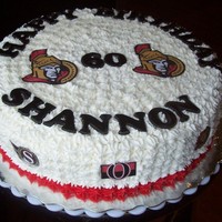 Ottawa Senators Hockey Cake This cake was commissioned for a 60th birthday. It's a chocolate cake covered in buttercream icing, marshmallow fondant letters (not...