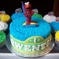 Elmo Cake Chocolate cake piped with buttercream icing and accented with marshmallow fondant.
