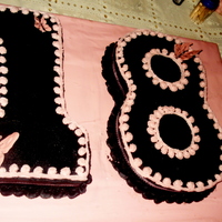 18Th Birthday Cake 18th birthday cake, the 1 is Vanilla and 8 is chocolate cake both topped with cherry frosting!
